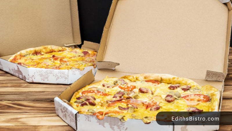 what are the potential dangers of putting pizza boxes inside the oven